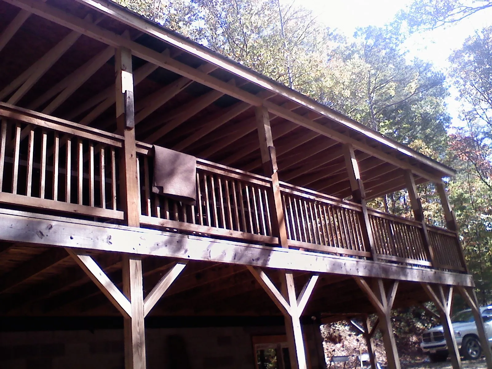 Timber framing under a new elevated porch and deck — Roof Leak Repair in Roland by Roofing Brothers
